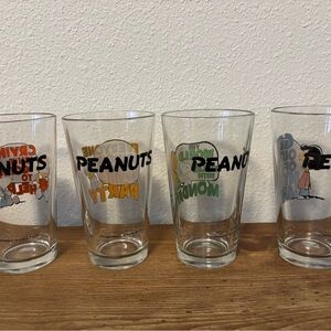 Peanuts Colorful Character set of 4 drinking glasses.2011 made in USA. Like new.